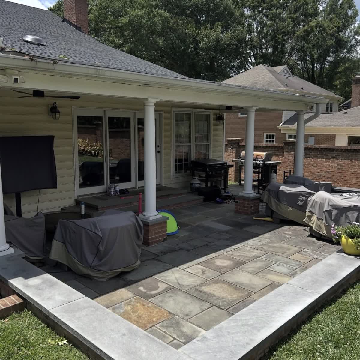 Bluestone patio before and after a full surface cleaning — before